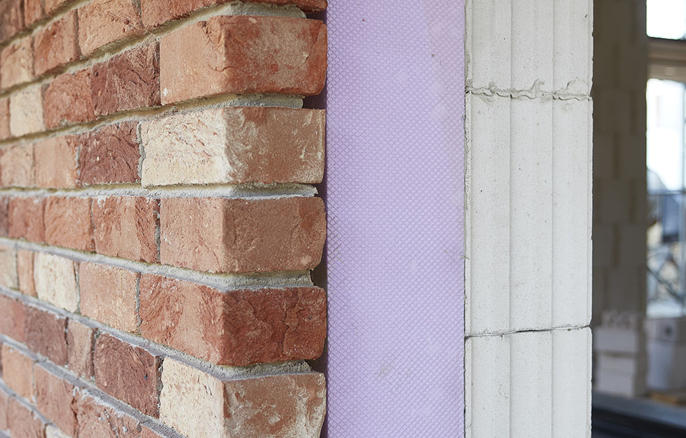 Wandaufbau mit KS-QUADRO, Dämmung und Fassade