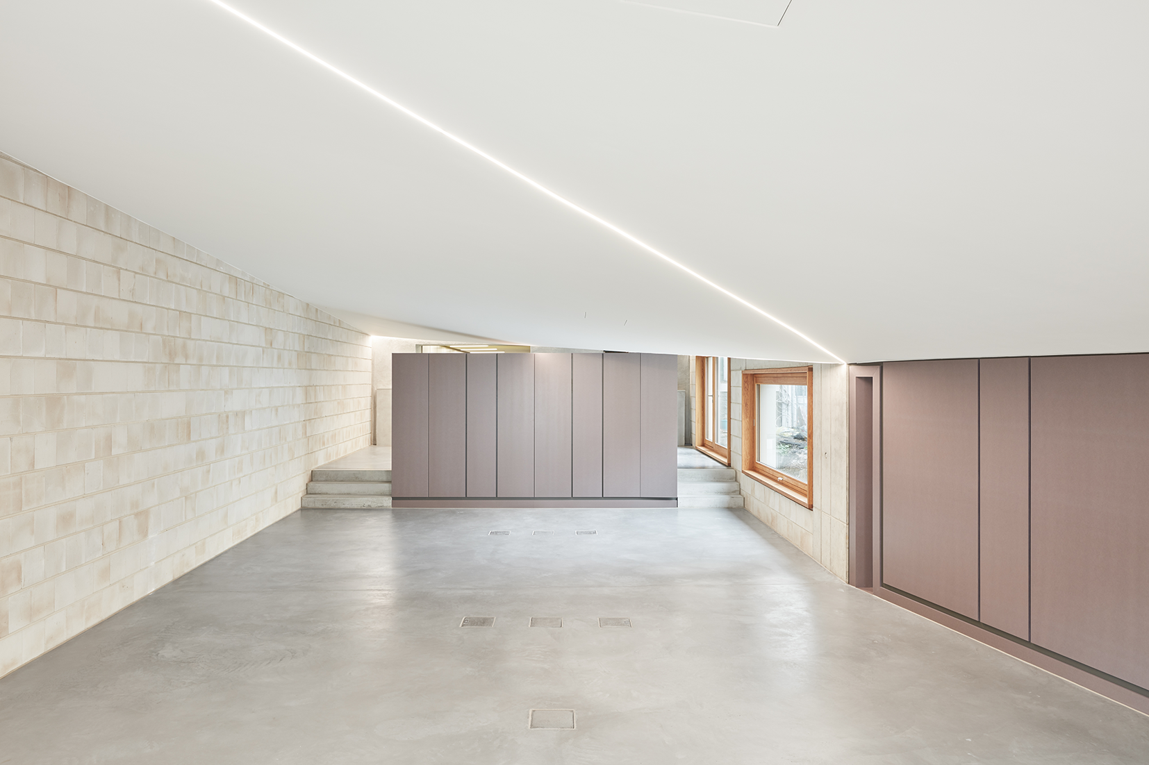 Architekturbüro Dannien Roller Flurbereich mit Kalksandsteinsichtmauerwerk