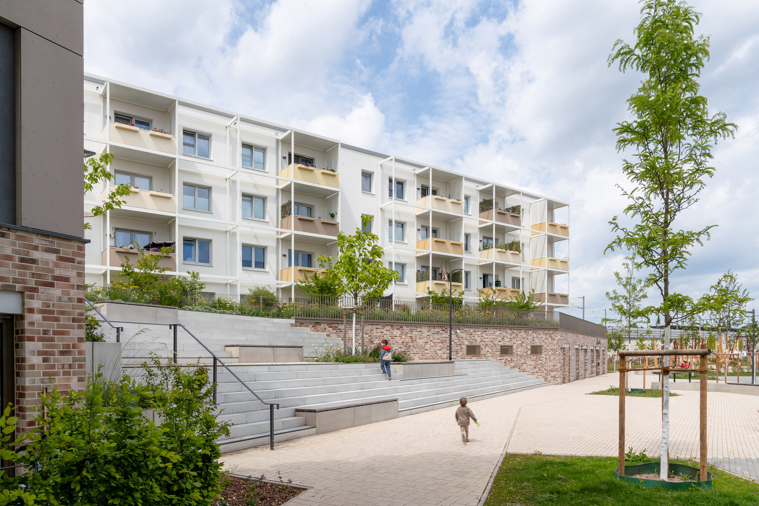 Wohnquartier Gretelriede mit Riegel, der das Quartier vom Bahnlärm abschirmt